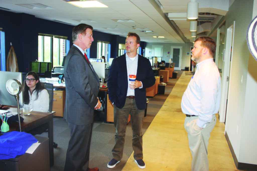 U.S. REP. DON BEYER began his day-long visit to Falls Church last Friday at the innovative Viget, where he was given a tour by co-owners Brian Williams and Andy Rankin. (Photo: News-Press)