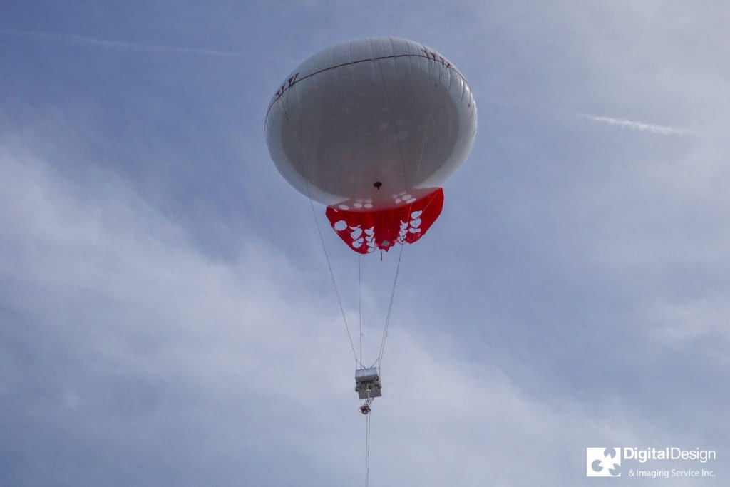 A DDIS custom-designed payload mount lofts cloud measurement sensors above the Falls Church shop.