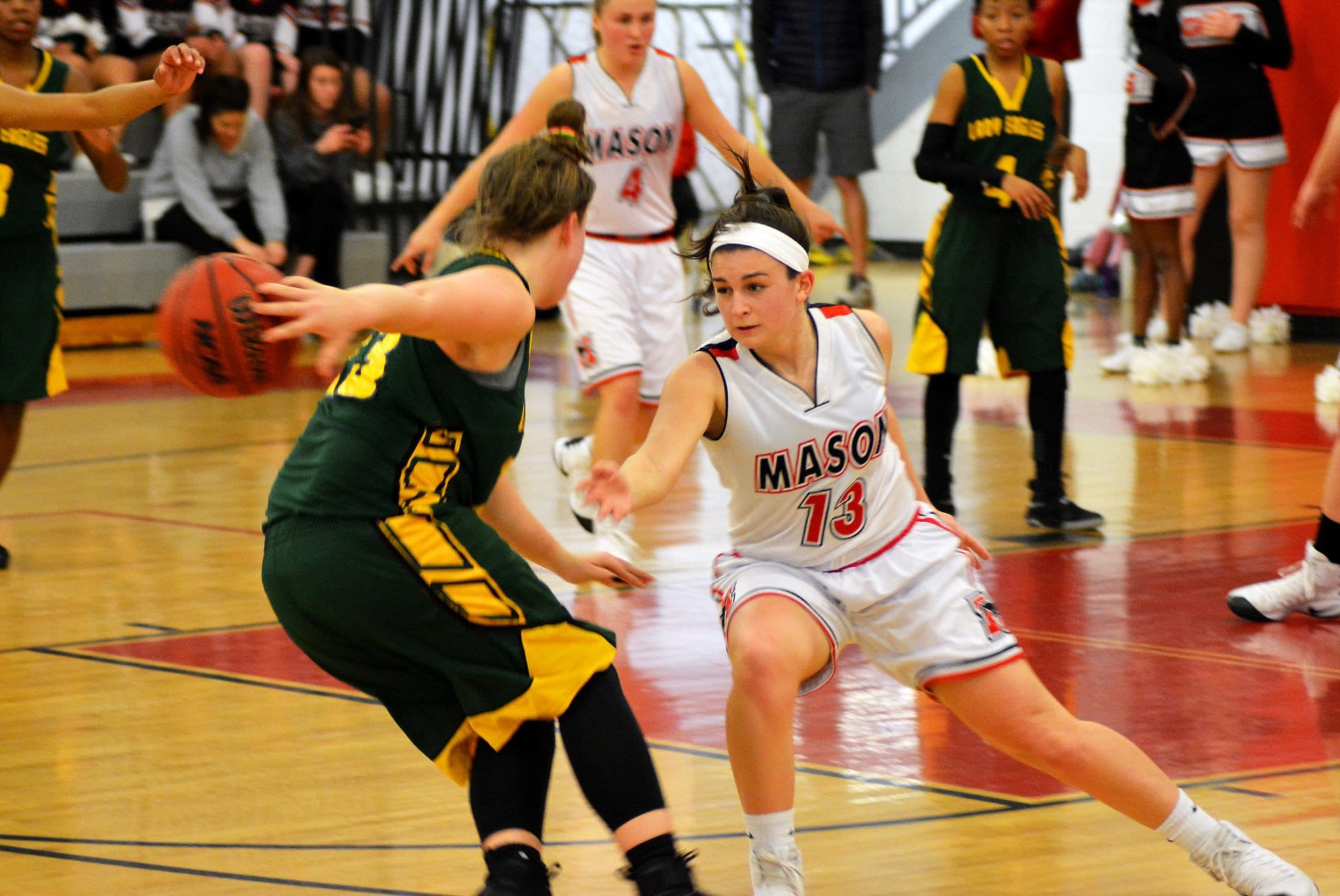 Sarah Lubnow plays defense during the Mustangs’ 51-37 win over the Greensville County High School Eagles in the 2A East Region tournament. (Photos: Carol Sly)