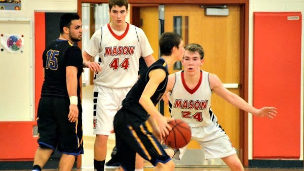 Mason's Thomas Creed (44) and Hollman Smith (24) lock in on defense against Central (Photo: Carol Sly)