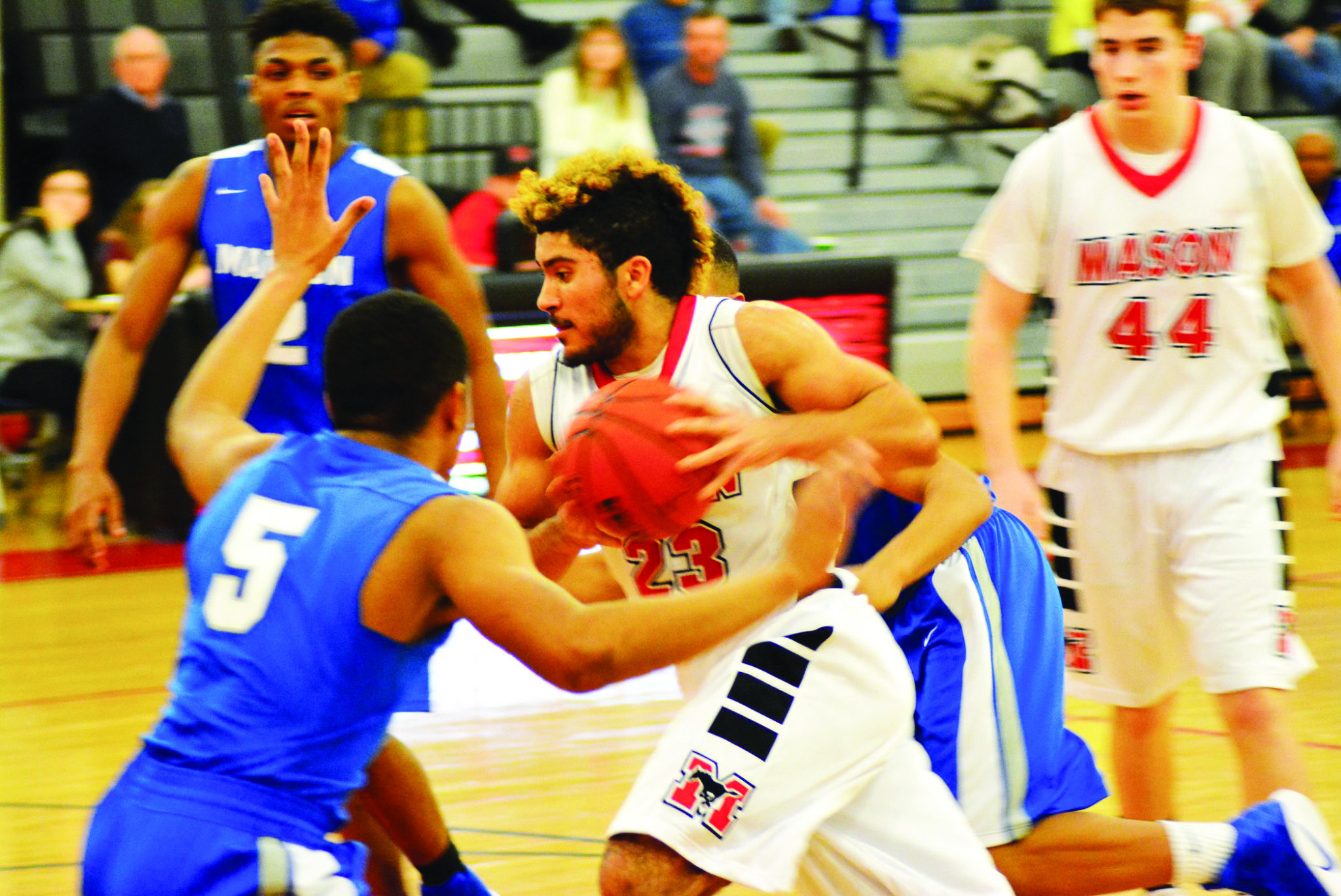 MASON’S Dustin Green drives to the basket in the Mustangs’ 51-47 win over Madison. (Photo: Carol Sly)