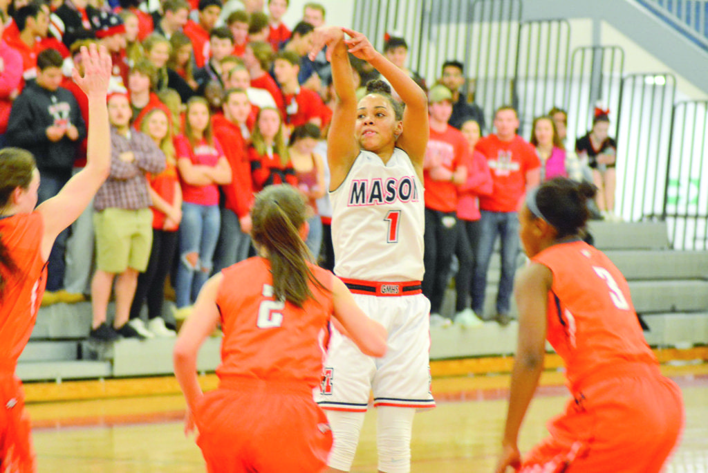 George Mason High School’s Nicole Bloomgarden follows through on a 3-pointer during the Mustangs’ 68–39 win against Clarke County. (Photo: Carol Sly)