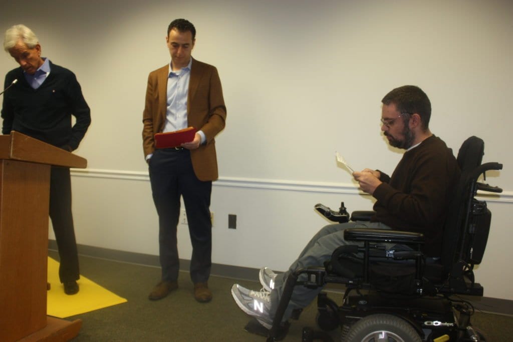 JUSTIN DOLAN (right) made an appeal to State Sen. Dick Saslaw (left) and Del. Marcus Simon (center) for a restoration of state funds for developmental disability support at a town hall meeting at the F.C. Community Center Saturday. (Photo: News-Press)