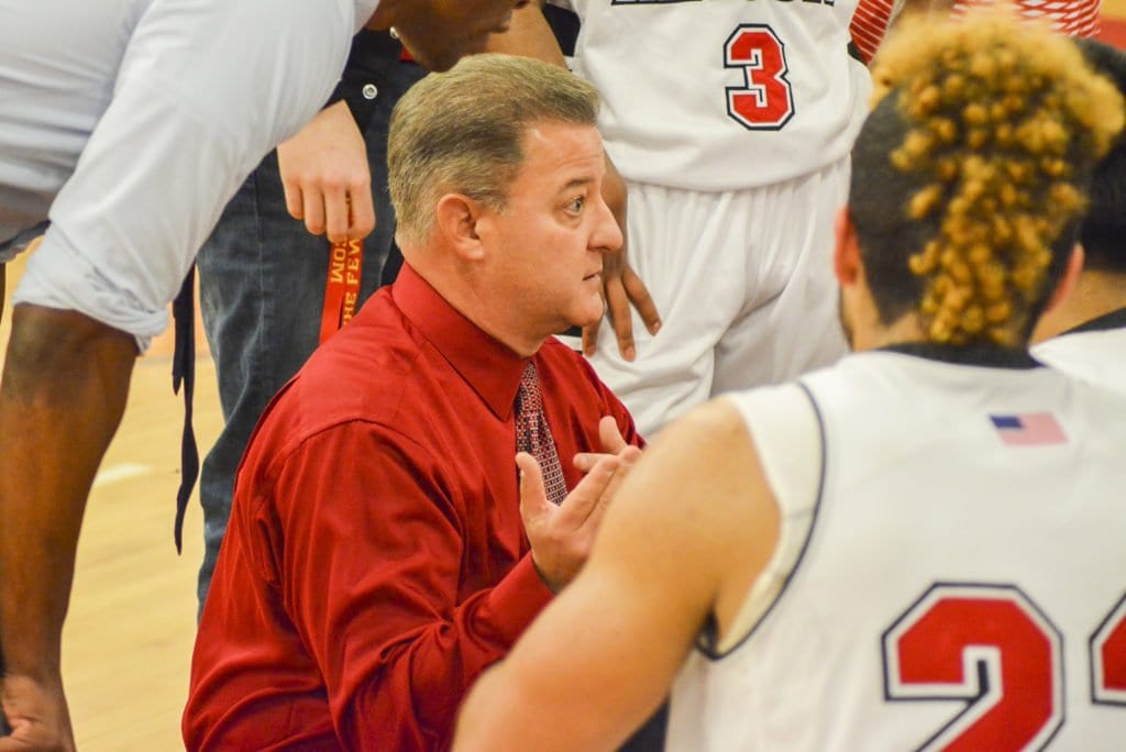 MASON HEAD COACH CHRIS CAPANNOLA speaks to his team during a recent win over Pope John Paul the Great Catholic High School. (Photo: Carol Sly)