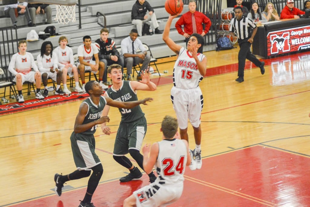 MASON'S MAX ASHTON goes for two points during the Mustangs' recent win. (Photo: Carol Sly)