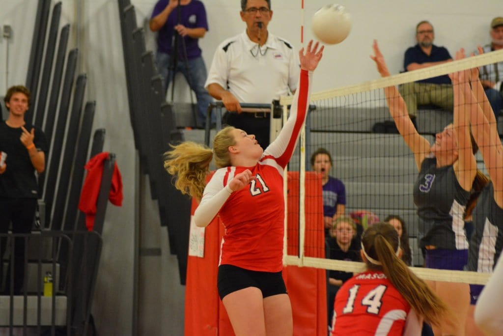 SOPHOMORE HITTER McKenzie Brady tips the ball over the net during the Mustangs’ 3-0 win over Strasburg High School in the Conference 35 tournament. The Mustangs take on Clarke County in the tourney final tonight. (Photo: Carol Sly)