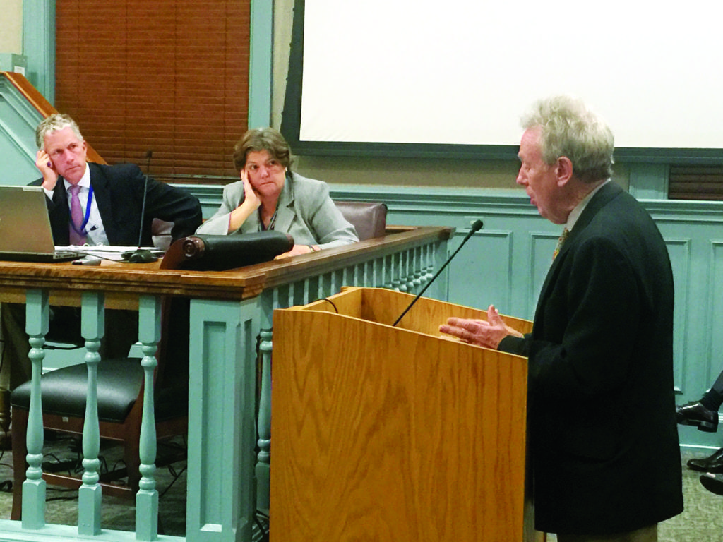 RICHARD GOFF (right), director of the City of Falls Church’s Economic Development Office, made the case for a significant expansion of the City’s tax abatement incentive for office development to the City Council Tuesday night. City Manager Wyatt Shields (far left) and City Attorney Carol McCoskie look on. (Photo: News-Press)