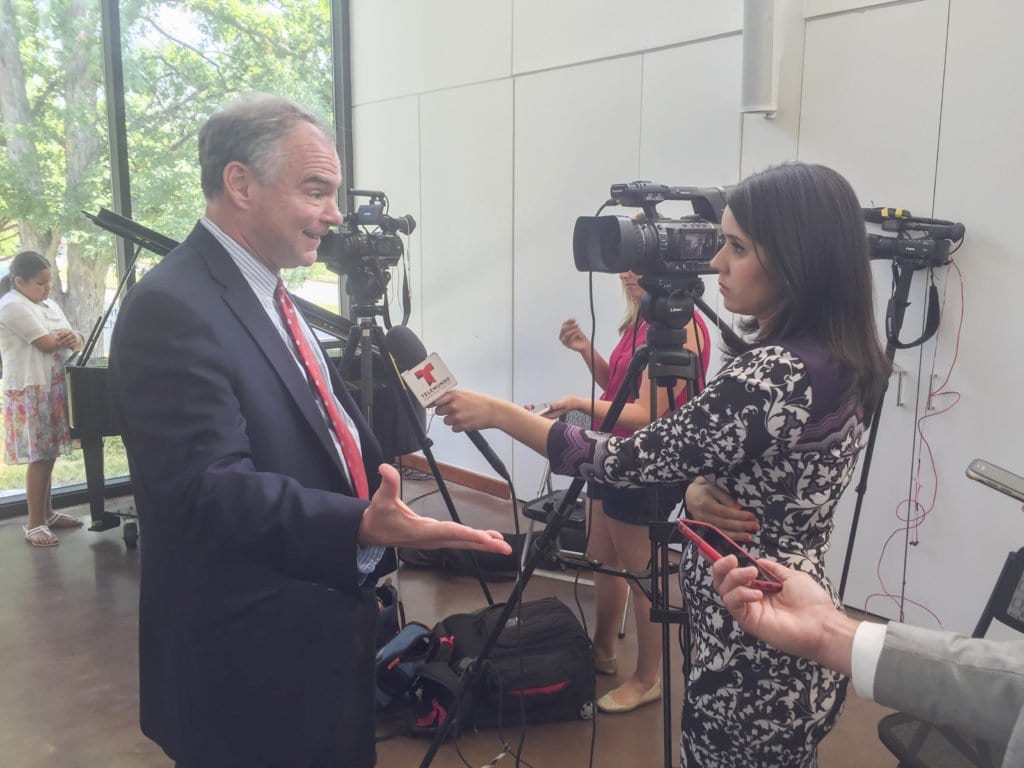 THOUGH SWAMPED by scores of media outlets in Arlington Thursday morning, U.S. Sen. Tim Kaine took time to answer questions in the Spanish language he is fluent in, as he did shown here. (Photo: News-Press)