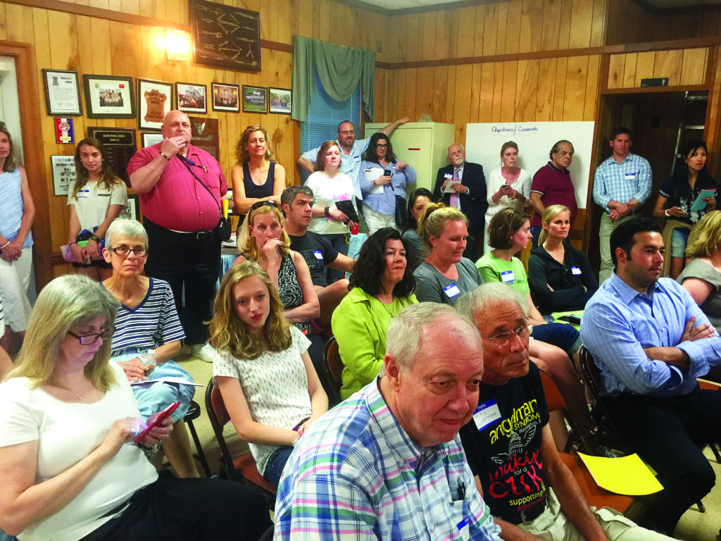 AMONG THE MORE than 80 Falls Church citizens who attended last Thursday’s meeting of “Families for the Falls Church Way in Our Public Schools” were those who had to settle for Standing Room Only. (Photo: News-Press)