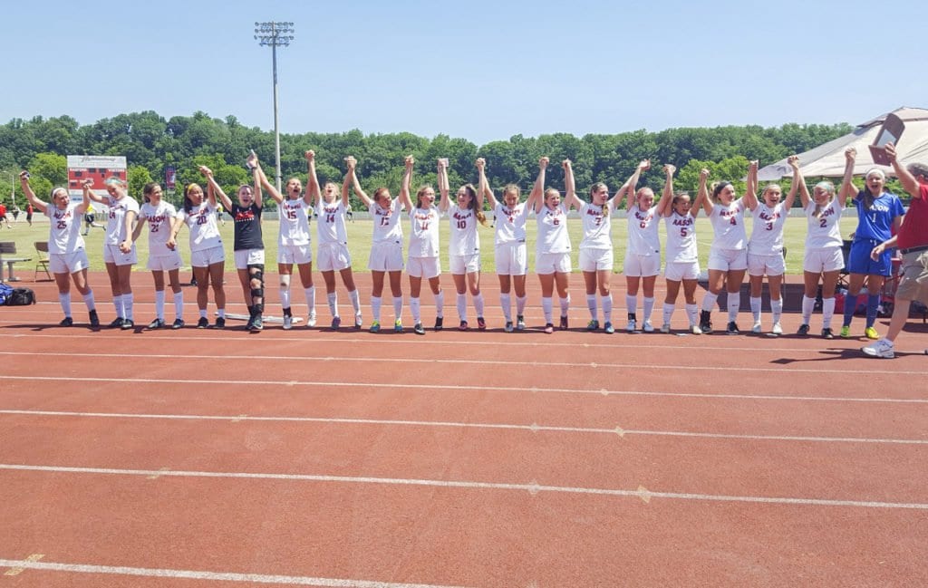 The George Mason High School varsity girls soccer team stands together at Radford University after winning their ninth straight state title. (Photo: Courtesy of Allison Clink)