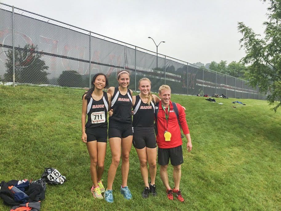 SOME OF MASON'S distance runners pose for a photo with Mason track and field coach Jeff Buck at the Virginia High School League's state championship over the weekend. (Photo: Courtesy of Jeff Buck)