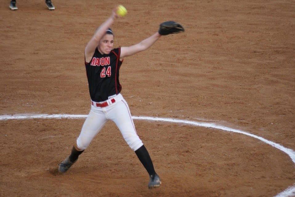 MASON SENIOR PITCHER JULIA FERRIS winds up a pitch during one of the Mustangs games in 2015. Although she pitched a game worthy of a win, the Mustangs were handed their first loss of the season on Friday, April 1 against Warren County High School. The Mustangs lost 5-1 to the Wildcats. (Photo: Carol Sly)