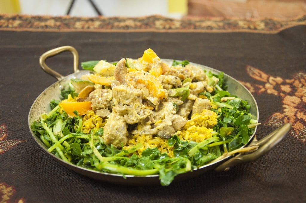 The Curried Tempeh and the Veggie Pizza from Chef Bon’s Yum Truck are two of the food truck’s newest dishes. The Curried Tempeh is served over a bed of watercress and fried rice, which is made up of brown basmati rice, quinoa and seeds. (Photo: Drew Costley/News-Press)