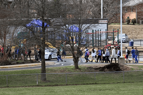 O'Connell students being evacuated from the school's premises following a bomb threat to the school this morning. (Courtesy Photo)