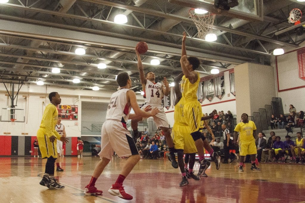MASON SENIOR ROBERT TARTT goes for two against Prince Edward County during the Region 2A East tournament. He recently broke the school’s career scoring record for boys basketball. (Photo: Drew Costley/News-Press)