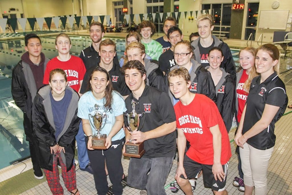 MASON’S SWIM AND DIVE TEAM poses with their Region 2A championship trophies after the regional meet on Saturday, Feb. 13. (Photo: Carol Sly)