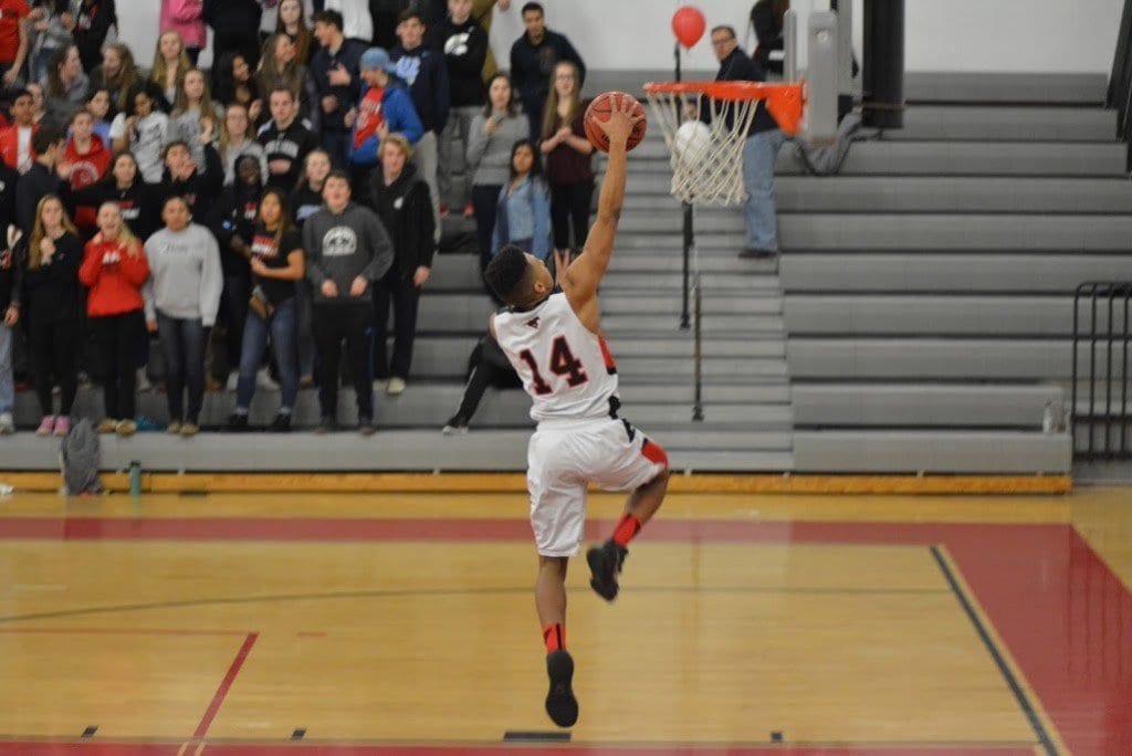 MASON SENIOR ROBERT TARTT takes off for a dunk during the Mustangs’ Conference 35 championship victory over Madison County High School on Saturday, Feb. 13. (Photo: Carol Sly)