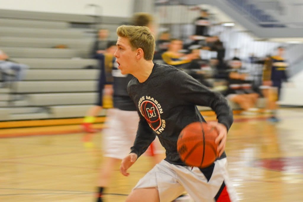 Mason senior guard Josh Allen drives toward the hoop during the Mustangs' warm up before their defeat of Rappahannock County High School. (Photo: Carol Sly)