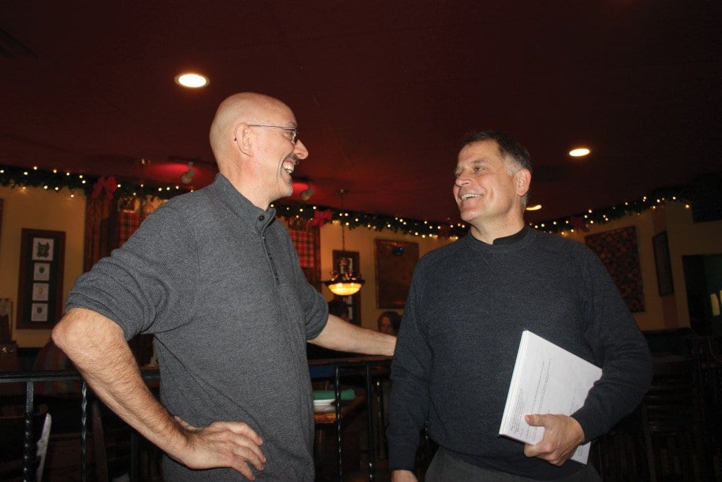 REV. JOHN OHMER (RIGHT), rector of the historic Falls Church Episcopal, and Christopher Fay, executive director of the F.C.-based homeless services non-profit, Homestretch, compared notes about working together on bringing a Syrian refugee family into Falls Church. (Photo: News-Press)