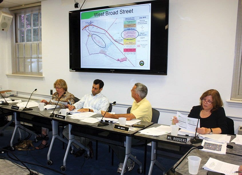 FALLS CHURCH SENIOR PLANNER Paul Stoddard (far left) spelled out parts of the “small area plan” that has been devised for the middle section of W. Broad St. to members of the Planning Commission Monday night. (Photo: News-Press)