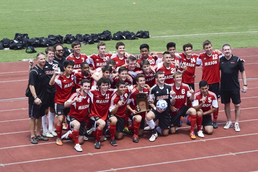 MASON’S BOYS SOCCER TEAM celebrate after winning their third consecutive state championship. The Mustangs were ranked the number two team in the nation and the top team in the region by National Soccer Coaches Association of America this week. (Photo: Liz Lizama)
