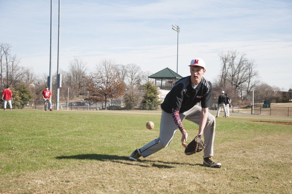 Senior pitcher/infielder Gabe Terry fields a ball during the Mustangs practice on Tuesday. Terry is one of several players returning to the team this season. (Photo: News-Press)