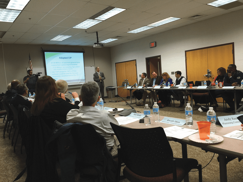 FALLS CHURCH CITY MANAGER Wyatt Shields presents the state of the City as over three dozen community leaders look on Monday night. (Photo: News-Press)