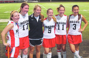 (L to R) Seniors Emma Graig and Anna Hennssey, Head Coach Amanda Crider and seniors Caroline Jarrard, Eleanor Langford and Angelika Johns at Mason’s senior night match against Patriot High School. The Mustangs beat the Patriots 3-1. (Photo: Justin Wills)