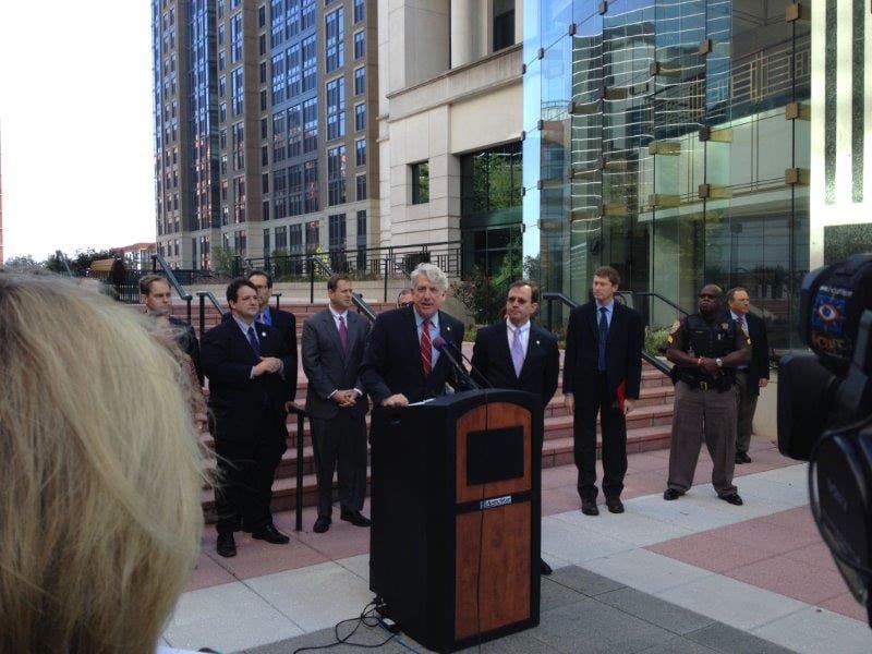 Virginia Attorney General Mark Herring (center) and Arlington County officials, including Arlington County Board Chair Jay Fisette, Clerk of the Court Paul Ferguson and others, gathered at the Arlington County Courthouse Monday, where Herring announced that same-sex marriage was now legal in the Commonwealth. (Photo: Mary Curtius)