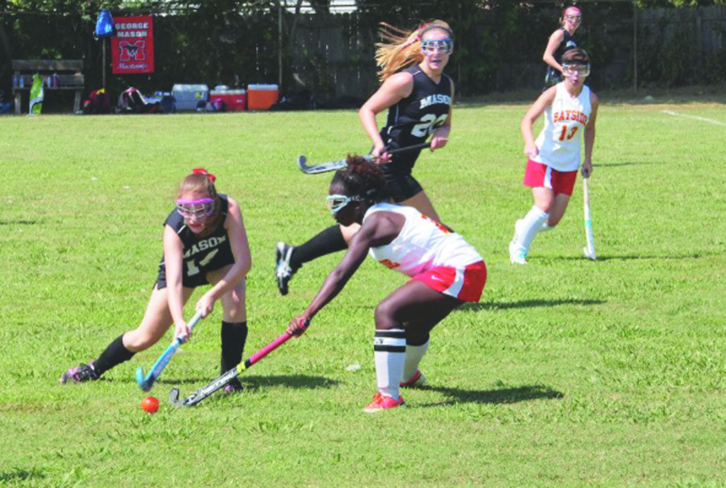 Junior Ashley Smith attempts to dribble around a defender from Bayside High School during the Mustangs’ 2-0 win last weekend. The Mustangs are in their second season as a varsity program. (Photo: Ian Graig)