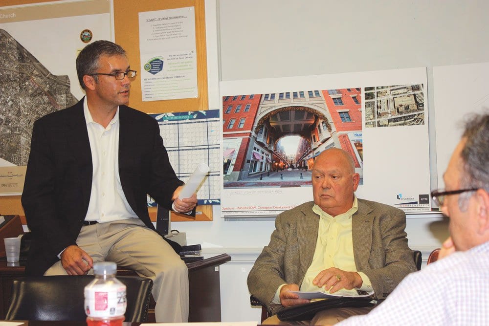 SPECTRUM DEVELOPMENT’S Peter Batten (left) and Dick Buskell (seated) presented their new “Mason Row” plan for W. Broad and N. West Street to the F.C. City Council’s Economic Development Committee Monday night. (Photo: News-Press)