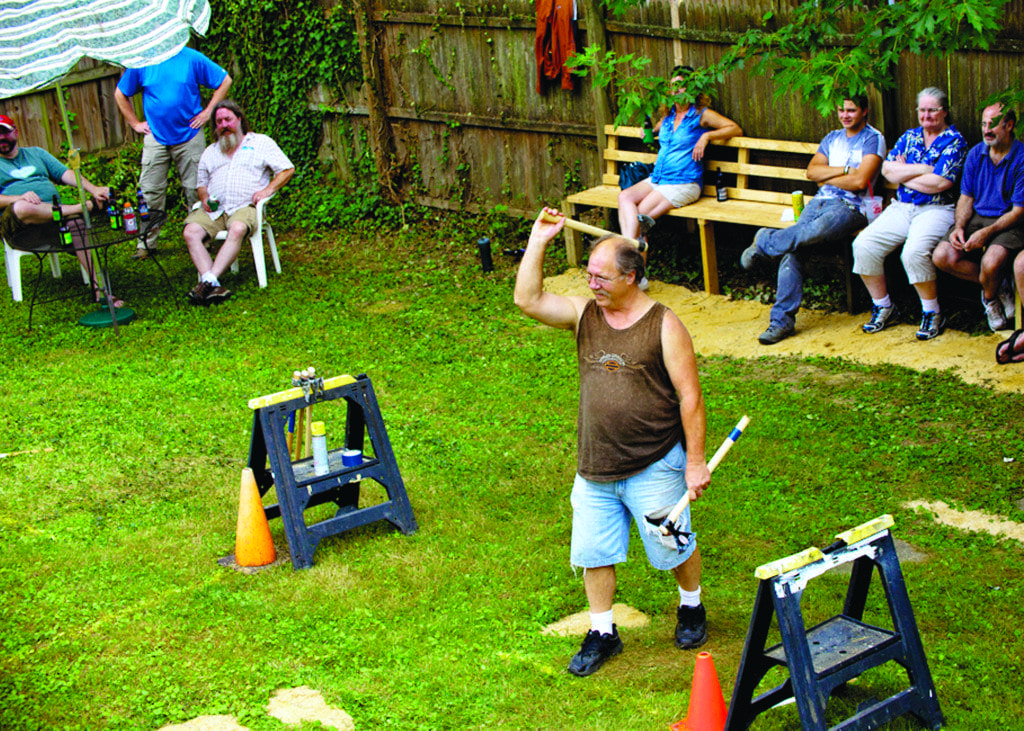 Jim Allen gets ready to launch an axe at the 2013 Lizzie Borden Axe Throwing compeition. Allen won the contest last year depsite being a novice in the sport. (Photo: Courtesy Bob Simpson)