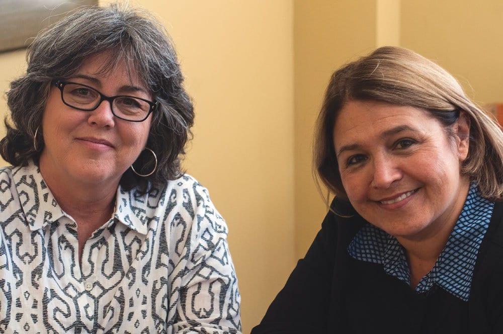 NEW FALLS CHURCH TREASURER Jody Acosta (left) and new Arlington Treasurer Carla de la Pava, friends for almost five decades, took office in their adjacent jurisdictions just days apart earlier this month. (Photo: News-Press)