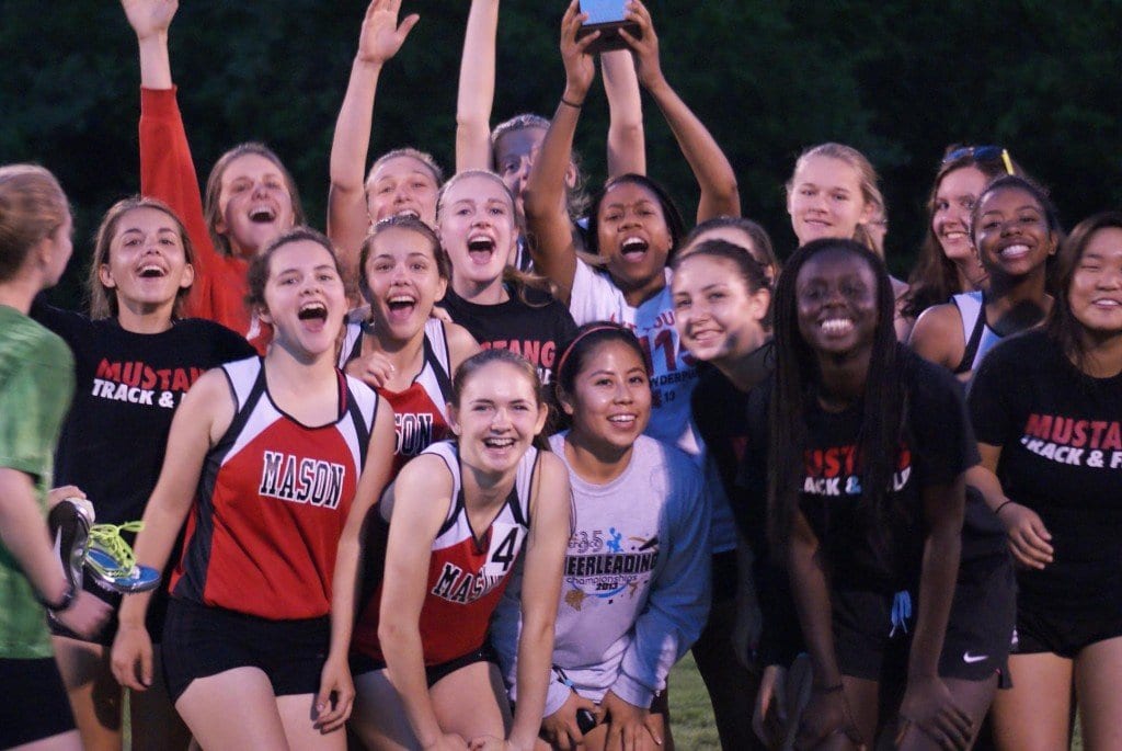 A jubilant George Mason girls track team celebrates its first-place finish at the Conference 35 meet on Tuesday. (Photo: Courtesy Carol Sly)
