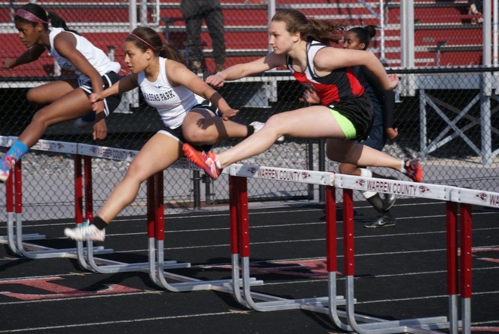 Mason's Korinne Wills went out fast for second in the 100-meter hurdles (18.5). (Photo: Courtesy Carol Sly)