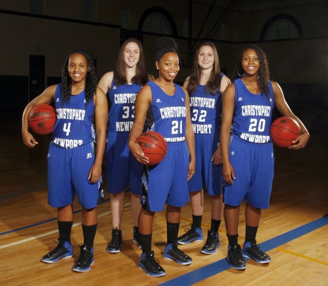 Former George Mason players Chantal Thomas (wearing number 22) and Nicole Mitchell (wearing number 33) are pictured with their Christopher Newport teammates. During their four-year career, the Christopher Newport Captains went 105-19. (Courtesy Photo)