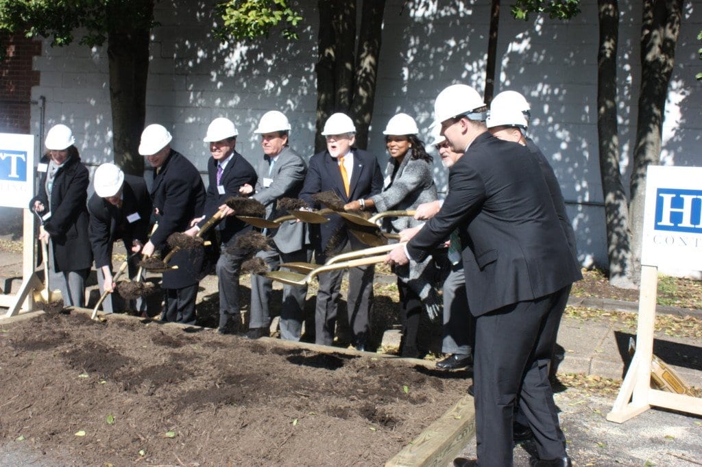 CEREMONIALLY BREAKING GROUND on the $100 million Harris Teeter development project on the old post office parking lot Monday morning were a collection of City officials, including Mayor David Tarter and City Manager Wyatt Shields, the Rushmark development team mugging it in a photo op while cameras snapped Monday morning. The project is expected to be completed in roughly two years. (Photo: News-Press)