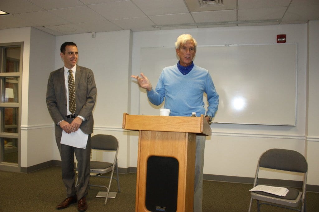 Photo caption: State Del. Marcus Simon (left) and State Sen. Richard Saslaw spoke to a large turnout for today's town hall meeting at the Falls Church Community Center. (Photo: News-Press). ,