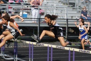Mason track athlete Lauren Bowling is pictured above competing in the 100m hurdles event at the Bull Run District meet last Wednesday. She finished fourth with a time of 0:17.61. (Photo: Carol Sly)