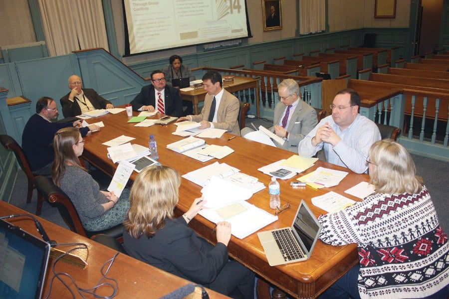 THE FALLS CHURCH SCHOOL BOARD engaged in intense deliberations Tuesday night prior to voting on its budget for the coming fiscal year that will now go to the City Council, where the budget needs to be approved for the requested enrollment-driven funding level or reduced to something less. (News-Press Photo)